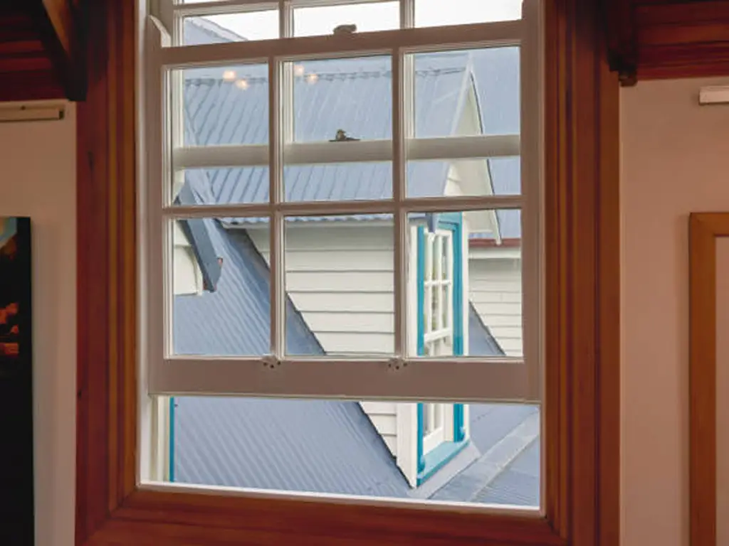 The Ultimate Guide to Types of Sliding Windows (Pros, Cons & Costs) 3 double-hung windows