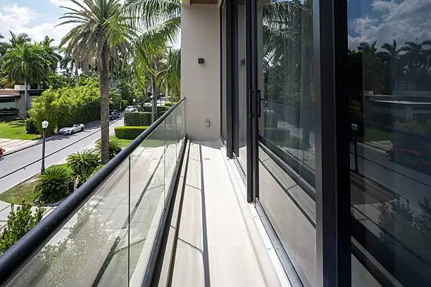 2026 Balcony Sliding Doors Design Guide: 10 Stunning Ideas & Ultimate Buying Tips 5 dark glass panels