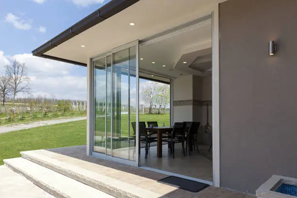 2026 Balcony Sliding Doors Design Guide: 10 Stunning Ideas & Ultimate Buying Tips 2 floor-to-ceiling panoramic doors